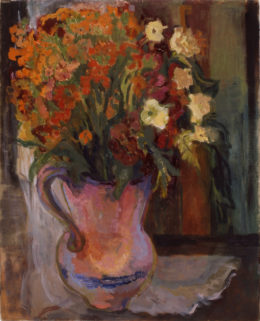 Keramikkrug mit gelben, roten und weißen Blumen